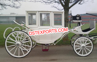 White Covered Horse Drawn Carriage